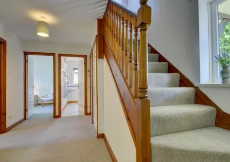 The stairs up to the first floor at Sundowner, Croyde