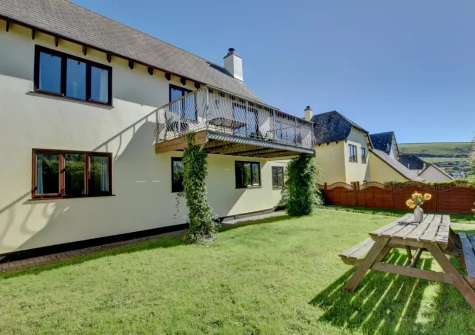 The enclosed garden & alfresco dining area at Sundowner, Croyde