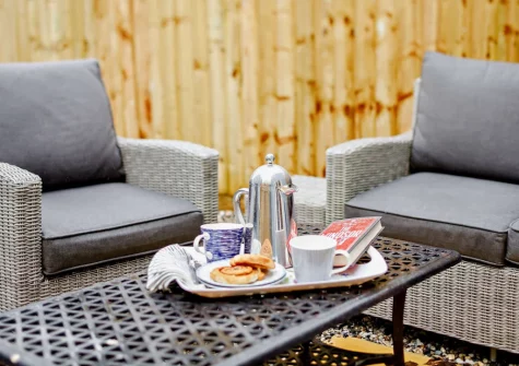 The enclosed gaden & outdoor sitting area at Sunny View, Appledore