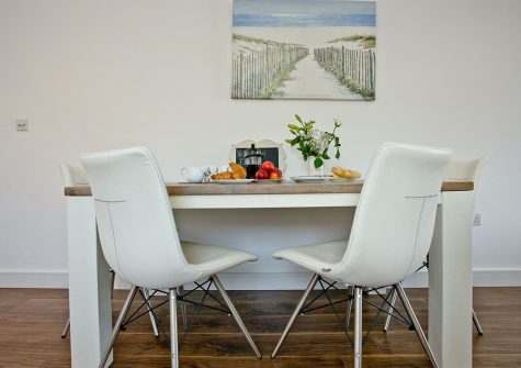 The dining area at Sunnymead Penthouse, Exmouth