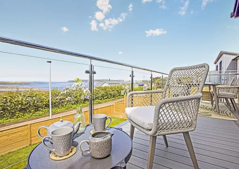 The decked balcony & outdoor sitting area at Sunset Bay, Appledore