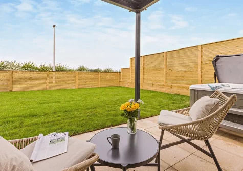 The patio, outdoor sitting area & garden at Sunset Bay, Appledore