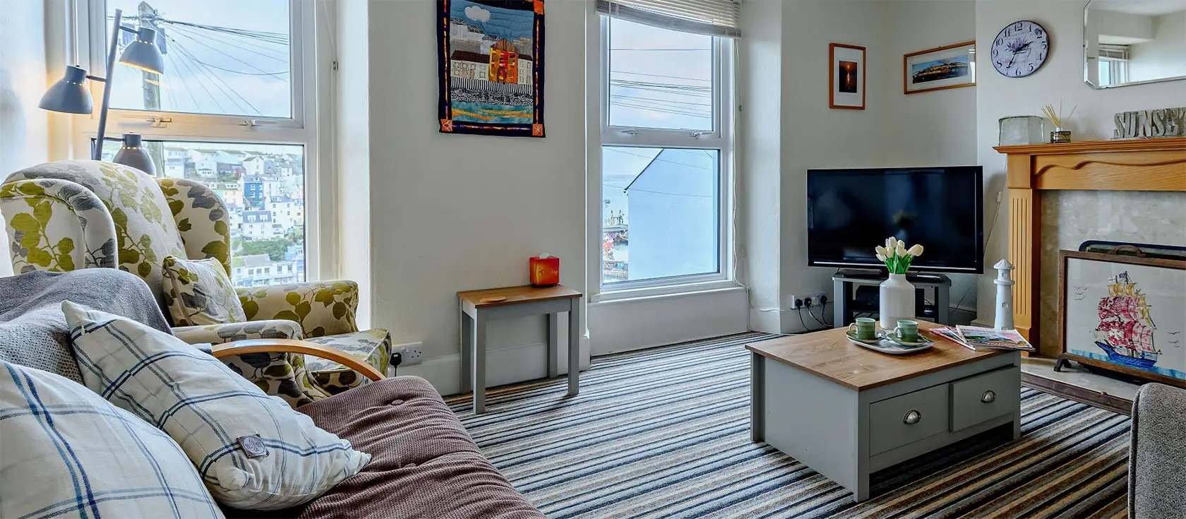 Sunset Cottage, Brixham is a delightful 3-bedroom cottage in Devon, offering stunning harbour views, a cozy living space, and a tranquil outdoor area situated close to the town centre of Brixham. Comes with a private patio, garden, & decked terrace.