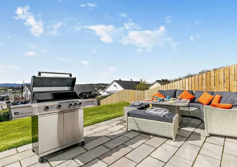 The patio, barbecue & alfresco dining area at Sunset View, Polruan