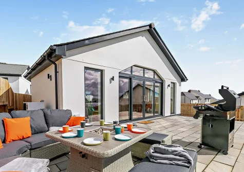 The patio, barbecue & alfresco dining area at Sunset View, Polruan
