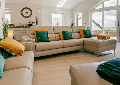 Sunset View, Polruan is a spectacular four-bedroom detached bungalow with mondern interiors and breathtaking sea views from its elevated position. Enjoy vast open-plan living spaces, enclosed garden with patio, and easy access to Cornwall's coast.