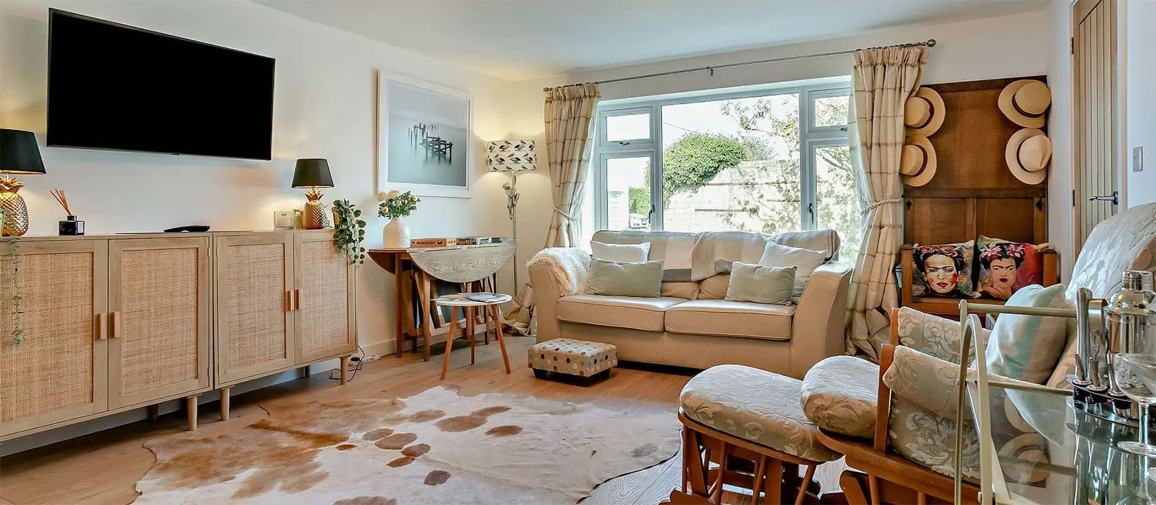 Surf Haven, Phillack is a stylish coastal annexe perfect for couples to spend a break with their four-legged friend. Enjoy contemporary interiors, a private garden with a fire pit, and easy access to Cornwall's finest beaches and attractions.
