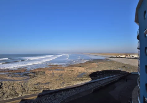 The beach & sea view from the balcony & outdoor sitting area at Surfers View, Westward Ho!
