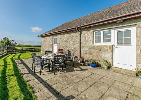 The patio, barbecue & alfresco dining area at Swallow Barn, Constantine