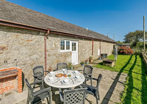 The patio, barbecue & alfresco dining area at Swallow Barn, Constantine
