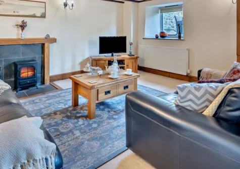 Swallow Barn Lakes, St Giles-on-the-Heath is a charming barn conversion with a private hot tub, two ensuite bedrooms, and access to seven acres of lakes and grounds, perfectly placed between Devon and Cornwall's finest coasts, on a private estate.