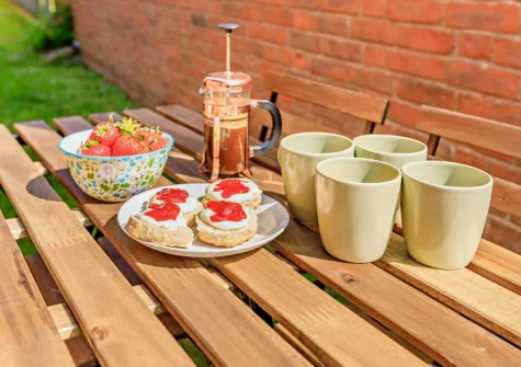 The shared garden & outdoor sitting area at Swallowfield Cottage, Newton Poppleford