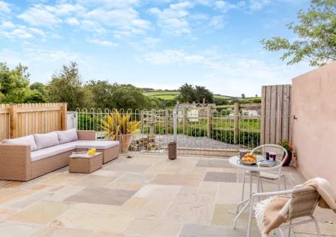 The large enclosed patio & outdoor sitting area at Swallows Nest, Ford