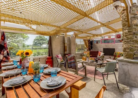 The alfresco dining & outdoor sitting area at Swallows Rest, Laneast