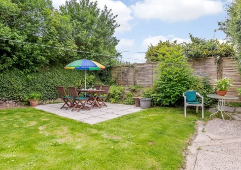 The patio, alfresco dining area & garden at Swallows Return, Woolfardisworthy
