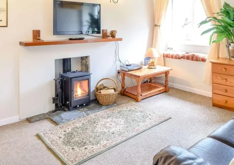 Swallows Return, Woolfardisworthy is a charming two-bedroom cottage retreat nestled in a peaceful village setting surrounded by rolling countryside. Enjoy cosy interiors, wood burner, enclosed garden, and easy access to North Devon's coastline.