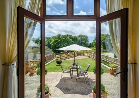 The patio, alfresco dining area & garden at Sweetcombe Roost, Sidbury