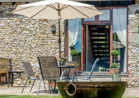 The patio & alfresco dining area at Sweetcombe Roost, Sidbury