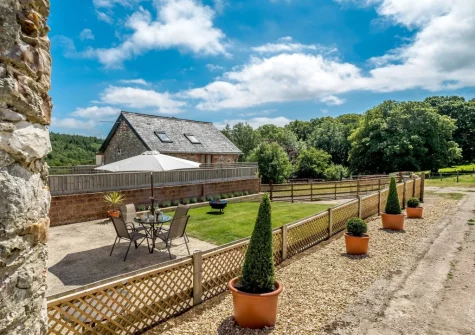 The patio, alfresco dining area & garden at Sweetcombe Roost, Sidbury