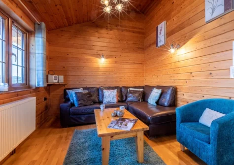 The living area at Swift Lodge 17, Clovelly Lakes, Higher Clovelly