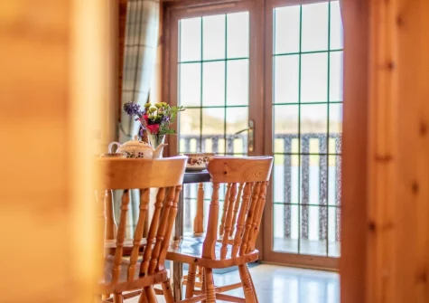 The dining area at Swift Lodge 17, Clovelly Lakes, Higher Clovelly