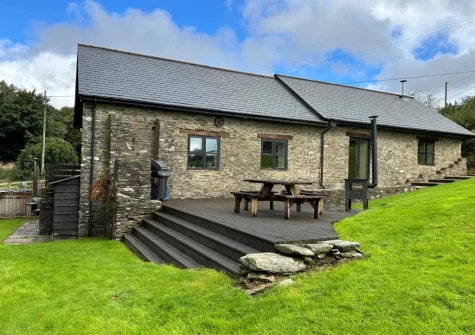 The patio, barbecue, alfresco dining area & garden at Swincombe Mill, Challacombe