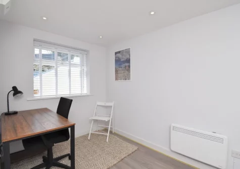 The garden room with desk workspace at Syringa, Beer