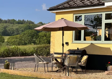 The patio, barbecue, alfresco dining area & garden at Tale Head, Broadhembury