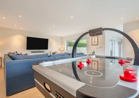 The living room with games table at Tamar, St Merryn