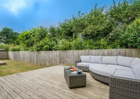 The decked patio, outdoor sitting area & garden at Tamar, St Merryn