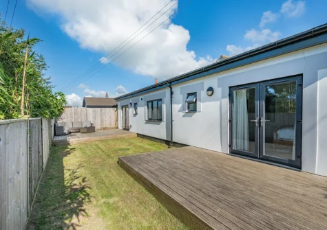 The decked patio, outdoor sitting area & garden at Tamar, St Merryn