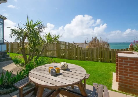 The patio, barbecue, alfresco dining area & garden at Tamarind, Porthleven