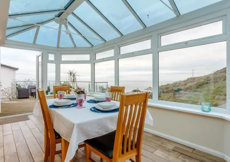 The conservatory dining room at Tamarisk, Downderry