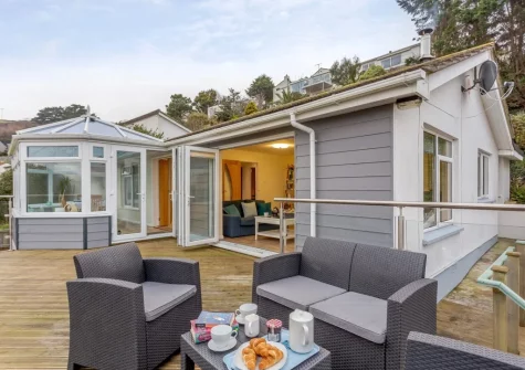 The decked patio & outdoor sitting area at Tamarisk, Downderry