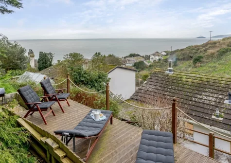 The decked upper terrace & outdoor sitting area at Tamarisk, Downderry