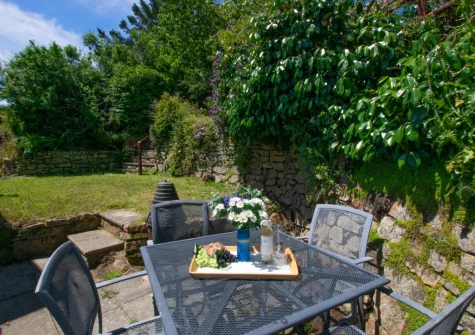 The rear terraced garden, patio & outdoor sitting area at Tamarisk, Mousehole