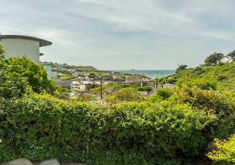 Views over the village and Polzeath beach from the garden at Tamarisk, Polzeath