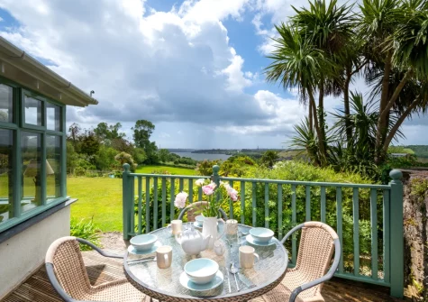 The decked patio & alfresco dining area at Tanglewood Cottage, Bere Alston