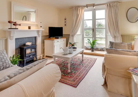 Tanglewood Cottage, Bere Alston, is a charming 2-bedroom rural retreat on the Tamar Estuary. Enjoy countryside views, a conservatory dining area, and access to Devon and Cornwall's finest attractions, perfect for couples or small families.