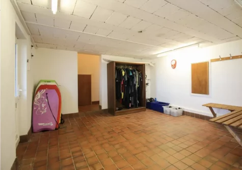 The beach changing room at Templeton, Trenance has a selection of bodyboards & wetsuits to use