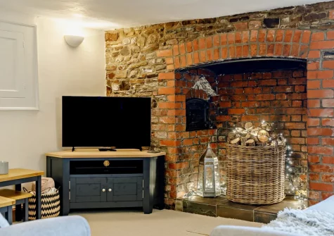 The living area at Thatch View Cottage, Roborough