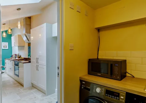 The kitchen & utility room at Thatch View Cottage, Roborough