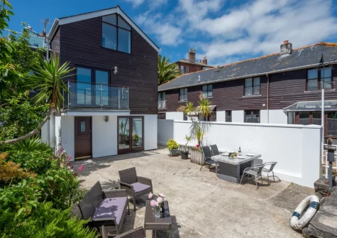 The courtyard, alfresco dining & outdoor sitting area at The Anchorage, Falmouth
