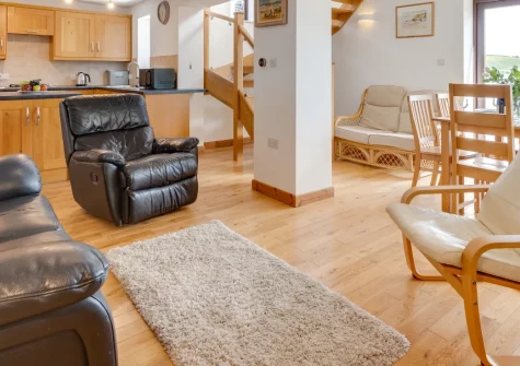 The Anchorage, Falmouth is a stunning three-storey, three-breoom waterfront property, positioned directly on Falmouth Harbour with its own private boat dock, spectacular coastal views from multiple levels, and elegant interiors throughout.