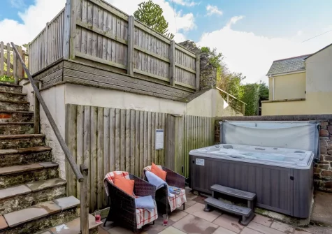 The enclosed patio, hot tub and outdoor sitting area at The Anchorage, Instow