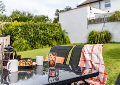 The alfresco dining area & enclosed garden at The Anchorage, Instow