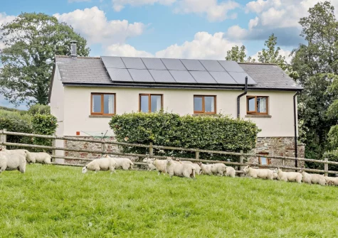 The Arch Barn is set on a 300-acre working farm with scenic countryside views and walks directly from your garden