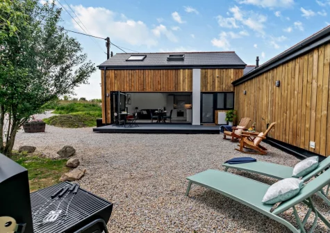 The barbecue, outdoor sitting area & garden at The Barn at Manor Meadows, Radnor