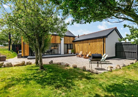 The barbecue, outdoor sitting area & garden at The Barn at Manor Meadows, Radnor