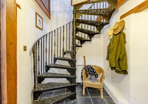 The stairs down from the first floor at The Barn, Hittisleigh